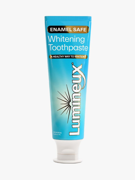 Lumineux Whitening Toothpaste blue tube of toothpaste on light gray background