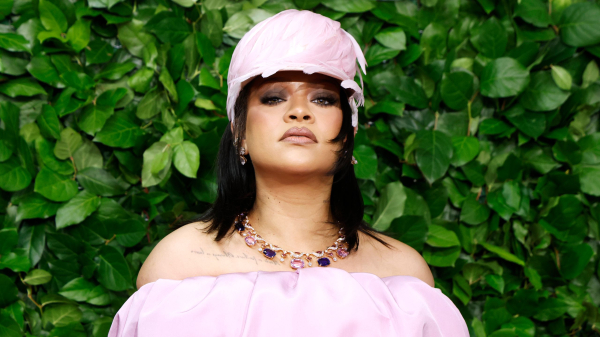 Rihanna’s Top Knot and Red Lip Are Making Me Nostalgic for 2012 — See Photos